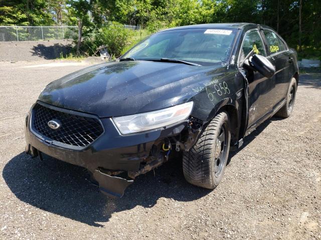 Photo 2 from auction – 2014 FORD TAURUS POL with VIN 1FAHP2MK6EG158448