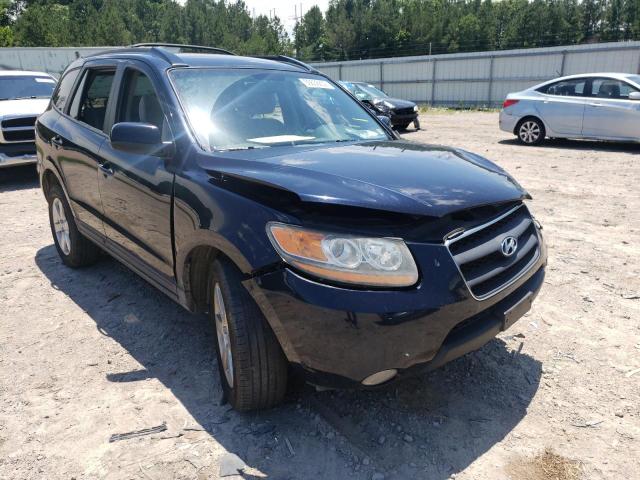 HYUNDAI SANTA FE 2009 with VIN 5NMSH73E19H304694 - Photo from auction