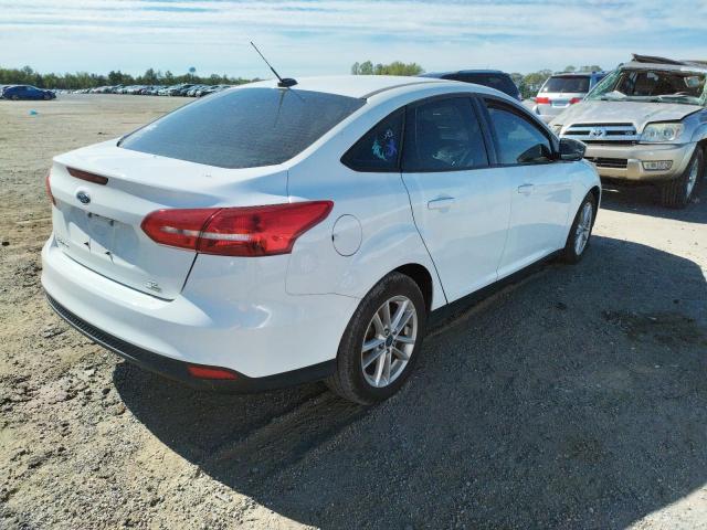 Photo 4 from auction – 2017 FORD FOCUS SE with VIN 1FADP3FE5HL228061