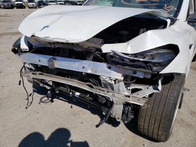 Photo 9 from auction – 2021 TESLA MODEL Y with VIN 5YJYGDEE6MF087176
