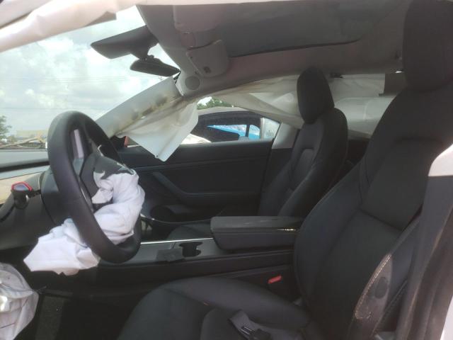 Photo 5 from auction – 2021 TESLA MODEL 3 with VIN 5YJ3E1EA6MF870395