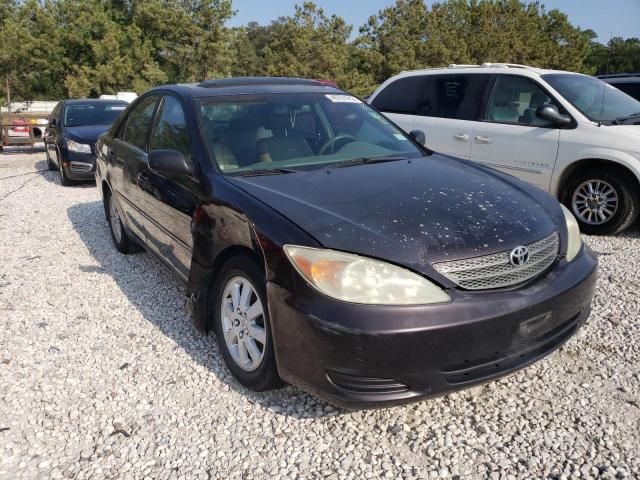 TOYOTA CAMRY LE 2002 with VIN 4T1BF32K82U527878 - Photo from auction