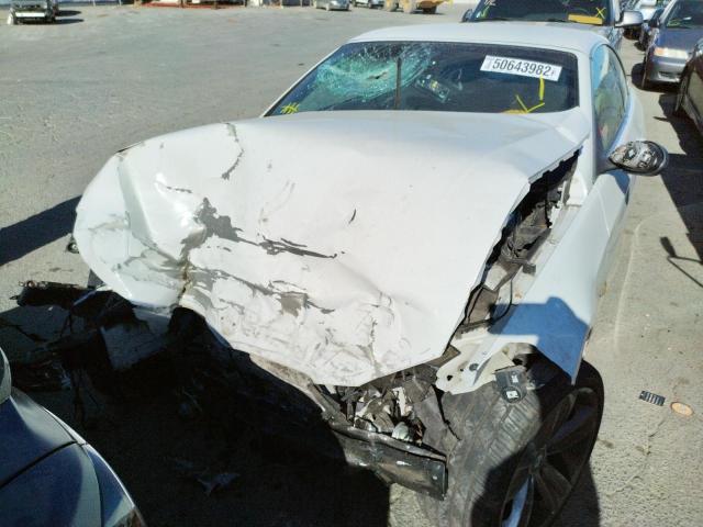 Photo 9 from auction – 2009 BMW 335 I with VIN WBAWL73579P473428