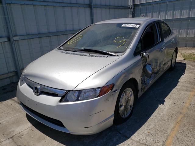 Photo 2 from auction – 2006 HONDA CIVIC HYBR with VIN JHMFA36216S012252