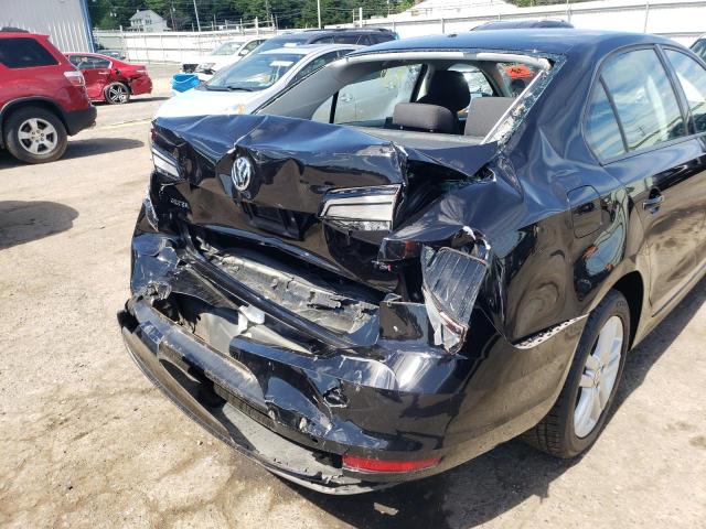 Photo 9 from auction – 2018 VOLKSWAGEN JETTA S with VIN 3VW2B7AJ2JM257367