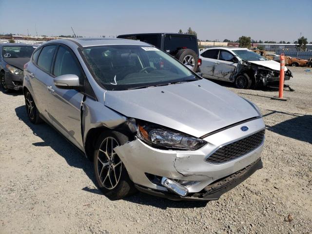 FORD FOCUS SEL 2018 with VIN 1FADP3M22JL224323 - Photo from auction
