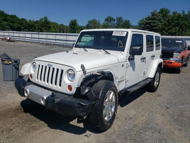 Photo 2 from auction – 2013 JEEP WRANGLER U with VIN 1C4BJWEG2DL704090