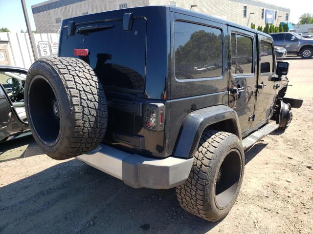 Photo 4 from auction – 2011 JEEP WRANGLER U with VIN 1J4HA7H19BL616359