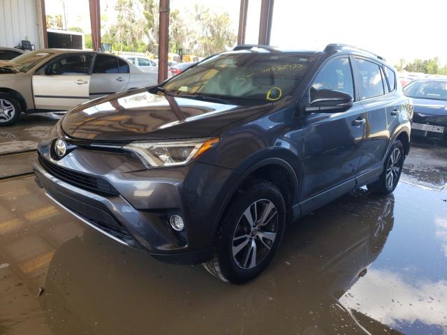 Photo 2 from auction – 2017 TOYOTA RAV4 XLE with VIN JTMWFREVXHD101276