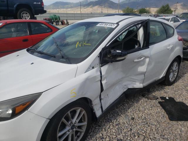 Photo 9 from auction – 2015 FORD FOCUS SE with VIN 1FADP3K21FL275130