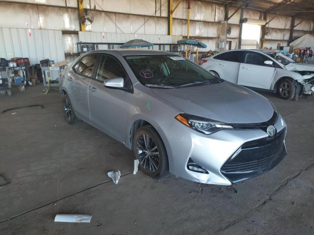 TOYOTA COROLLA L 2017 with VIN 5YFBURHE1HP725562 - Photo from auction