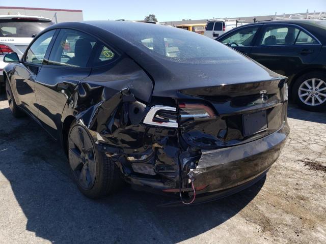Photo 9 from auction – 2021 TESLA MODEL 3 with VIN 5YJ3E1EA4MF093943