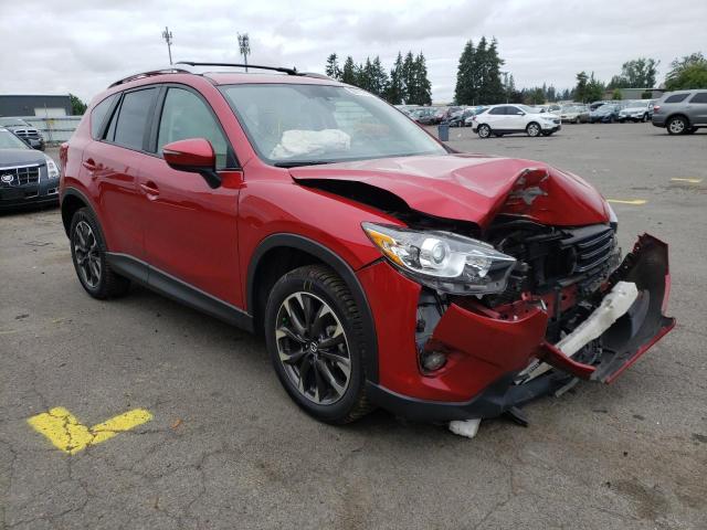 MAZDA CX-5 GT 2016 with VIN JM3KE4DY7G0763071 - Photo from auction