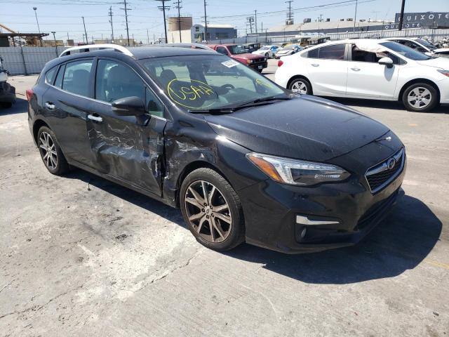 SUBARU IMPREZA LI 2018 with VIN 4S3GTAT6XJ3704735 - Photo from auction