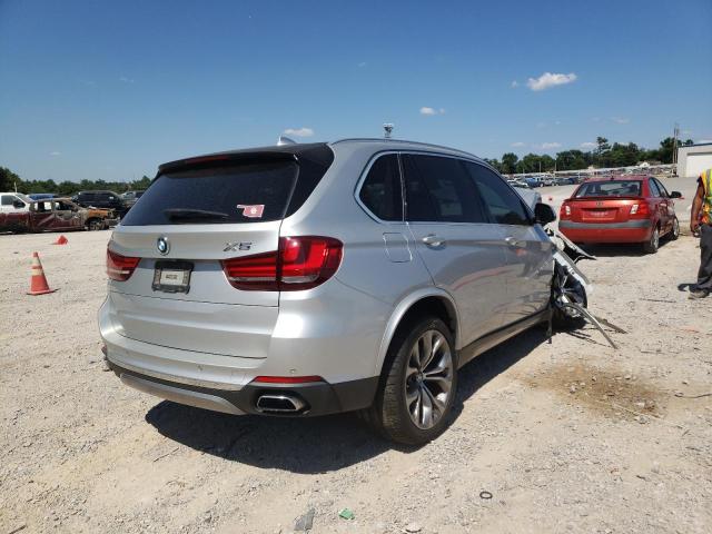 Photo 4 from auction – 2014 BMW X5 XDRIVE5 with VIN 5UXKR6C50E0J71992
