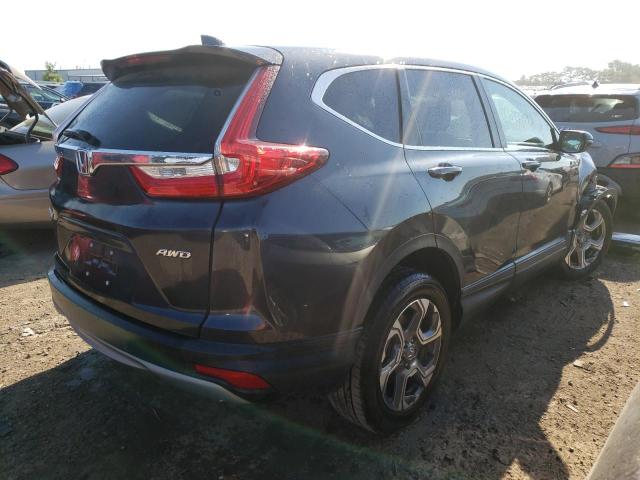 Photo 4 from auction – 2018 HONDA CR-V EXL with VIN 5J6RW2H87JL033809