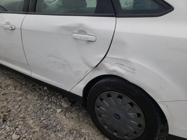 Foto 9 de la subasta – 2014 FORD FOCUS SE con VIN 1FADP3F21EL268459