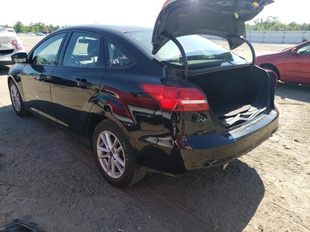 Foto 3 de la subasta – 2018 FORD FOCUS SE con VIN 1FADP3FE4JL202329
