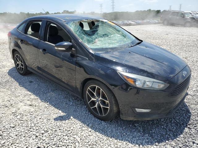 FORD FOCUS SE 2017 with VIN 1FADP3FE5HL289328 - Photo from auction