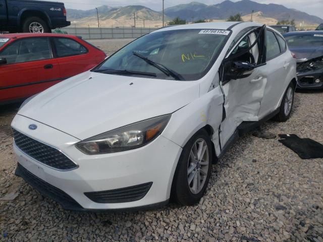 Photo 2 from auction – 2015 FORD FOCUS SE with VIN 1FADP3K21FL275130