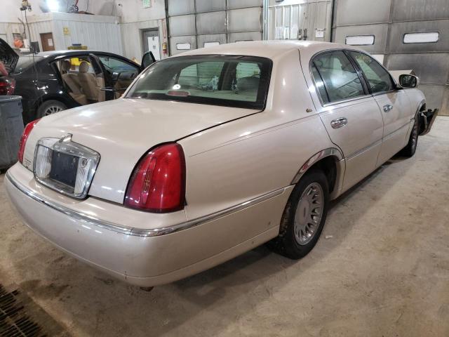 Photo 4 from auction – 2000 LINCOLN TOWN CAR C with VIN 1LNHM83W9YY818728