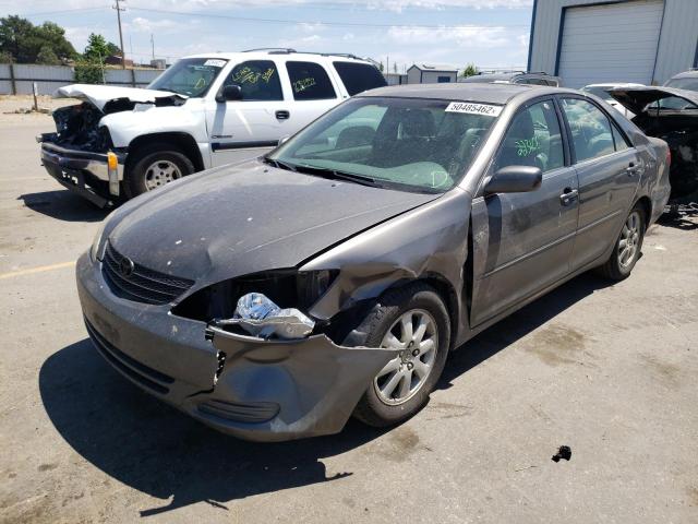 Photo 2 from auction – 2002 TOYOTA CAMRY LE with VIN 4T1BF30K12U514120