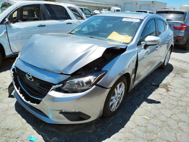 Photo 2 from auction – 2014 MAZDA 3 GRAND TO with VIN JM1BM1M70E1102331