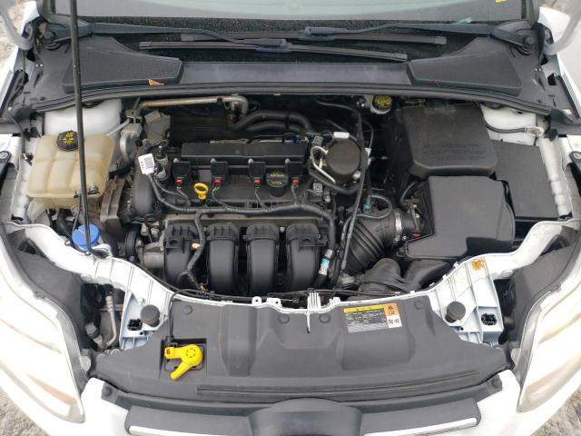 Foto 7 de la subasta – 2014 FORD FOCUS SE con VIN 1FADP3F21EL268459