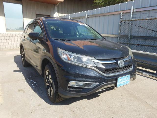 HONDA CR-V TOURI 2015 with VIN 5J6RM4H92FL095703 - Photo from auction