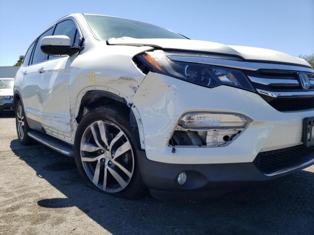 Photo 9 from auction – 2016 HONDA PILOT ELIT with VIN 5FNYF6H02GB044909