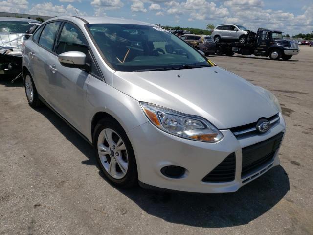 FORD FOCUS SE 2014 with VIN 1FADP3F23EL332579 - Photo from auction