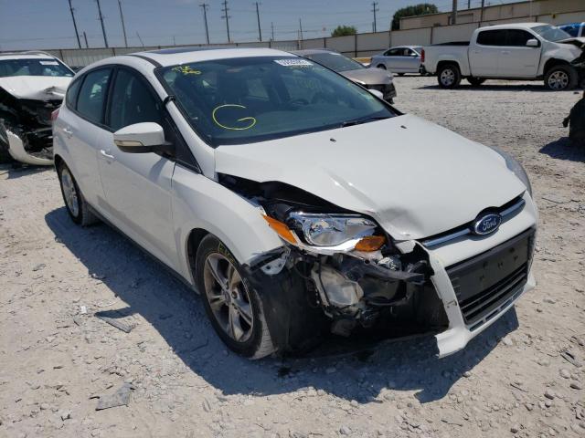 FORD FOCUS SE 2014 with VIN 1FADP3K28EL295485 - Photo from auction