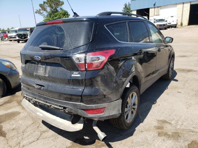 Photo 4 from auction – 2018 FORD ESCAPE SE with VIN 1FMCU0GD0JUD18412