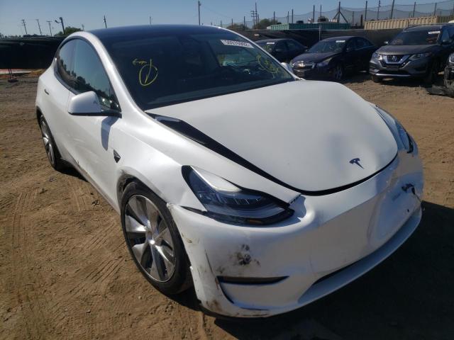TESLA MODEL Y 2022 with VIN 7SAYGDEE2NF321611 - Photo from auction