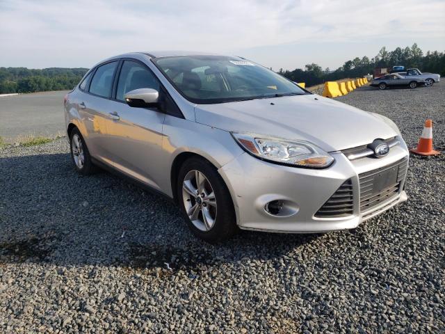 FORD FOCUS SE 2014 with VIN 1FADP3F23EL288227 - Photo from auction