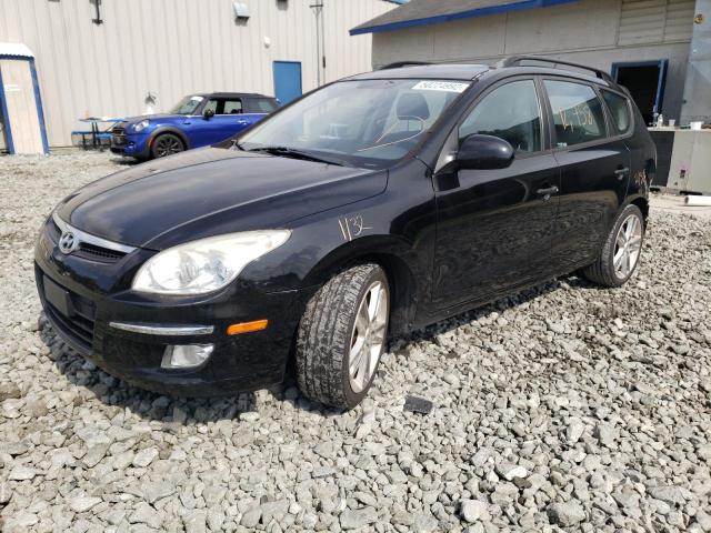 Photo 2 from auction – 2010 HYUNDAI ELANTRA with VIN KMHDC8AE7AU074202