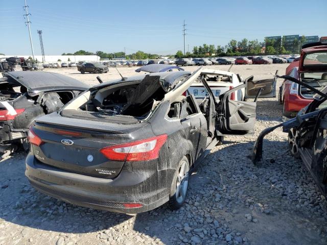 Photo 4 from auction – 2014 FORD FOCUS TITA with VIN 1FADP3J26EL320692