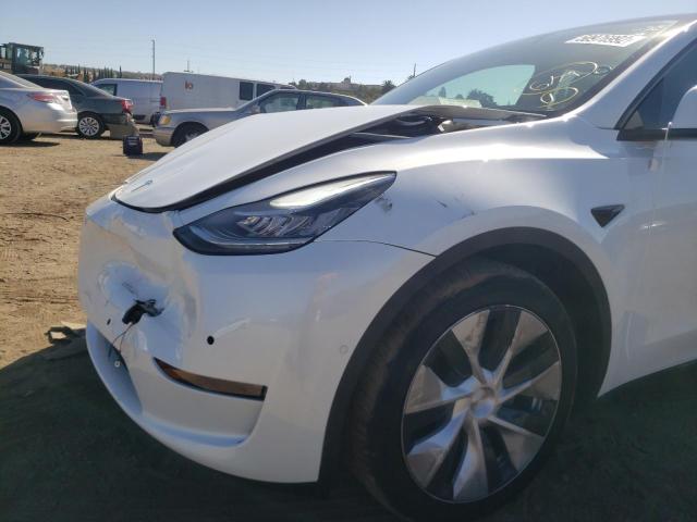 Photo 9 from auction – 2022 TESLA MODEL Y with VIN 7SAYGDEE2NF321611