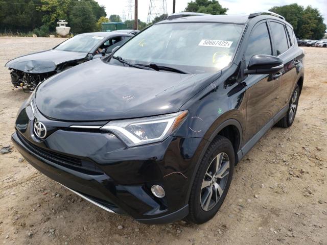 Photo 2 from auction – 2016 TOYOTA RAV4 XLE with VIN 2T3WFREV2GW286926