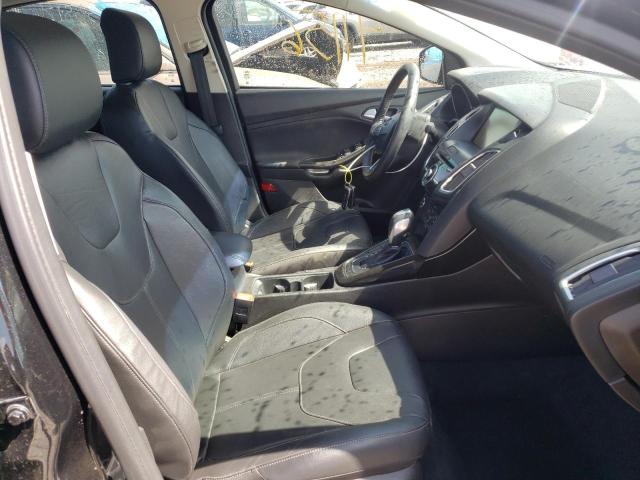 Photo 5 from auction – 2015 FORD FOCUS TITA with VIN 1FADP3J20FL314226