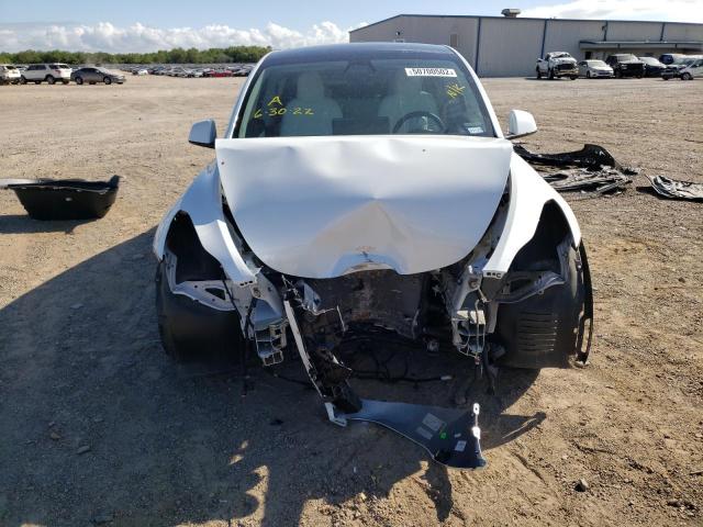 Photo 9 from auction – 2021 TESLA MODEL Y with VIN 5YJYGDEE7MF072332