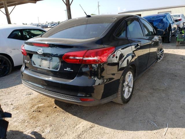 Photo 4 from auction – 2015 FORD FOCUS SE with VIN 1FADP3F24FL384840