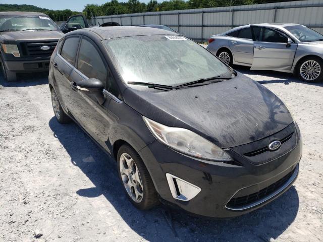FORD FIESTA SES 2011 with VIN 3FADP4FJ3BM141929 - Photo from auction