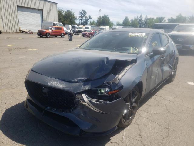Photo 2 from auction – 2021 MAZDA 3 PREMIUM with VIN JM1BPBNY3M1347403