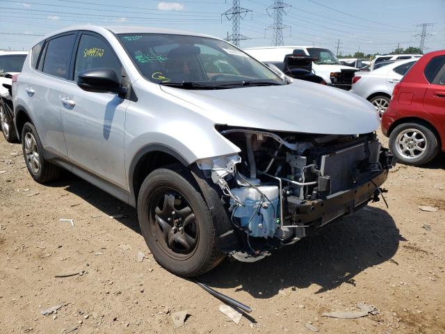 TOYOTA RAV4 LE 2014 with VIN JTMZFREV6EJ002352 - Photo from auction