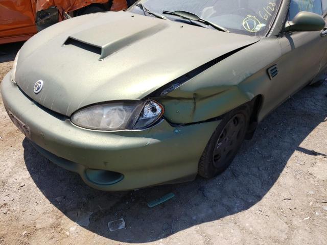 Photo 9 from auction – 1997 HYUNDAI TIBURON with VIN KMHJG24MXVU028196