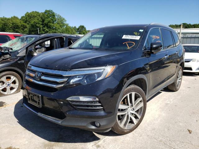 Photo 2 from auction – 2018 HONDA PILOT TOUR with VIN 5FNYF6H97JB063560