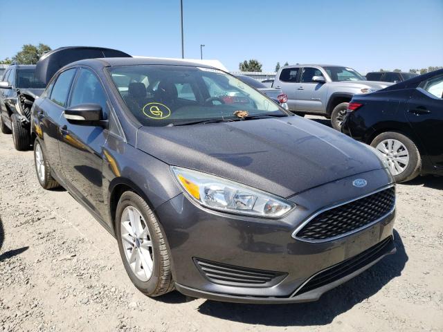FORD FOCUS SE 2015 with VIN 1FADP3F22FL334938 - Photo from auction