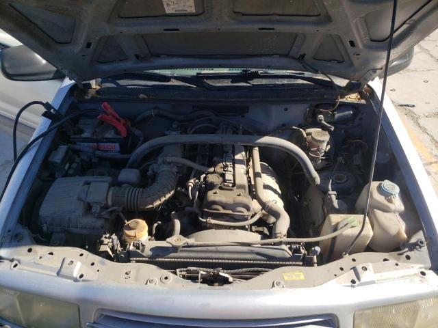 Photo 7 from auction – 1999 CHEVROLET TRACKER with VIN 2CNBJ13C4X6937271