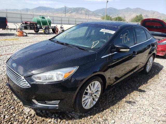 Photo 2 from auction – 2015 FORD FOCUS TITA with VIN 1FADP3J20FL314226